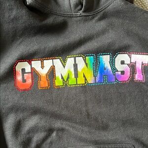 Black Kids Hoodie with Rainbow Gymnast Design, virtually new, size kid’s large